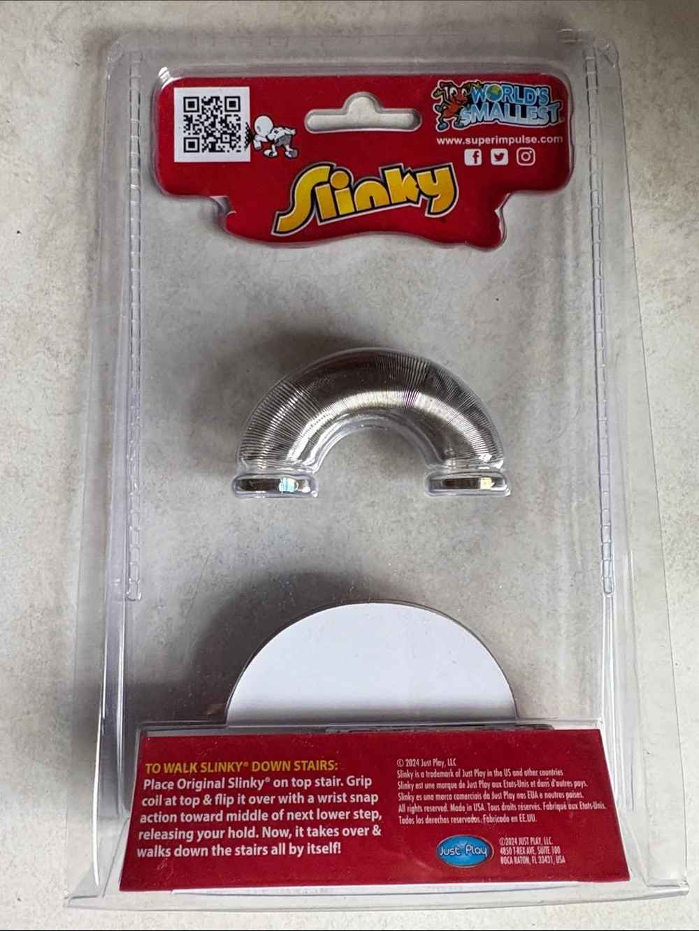 BNIB World's Smallest Slinky (really works)